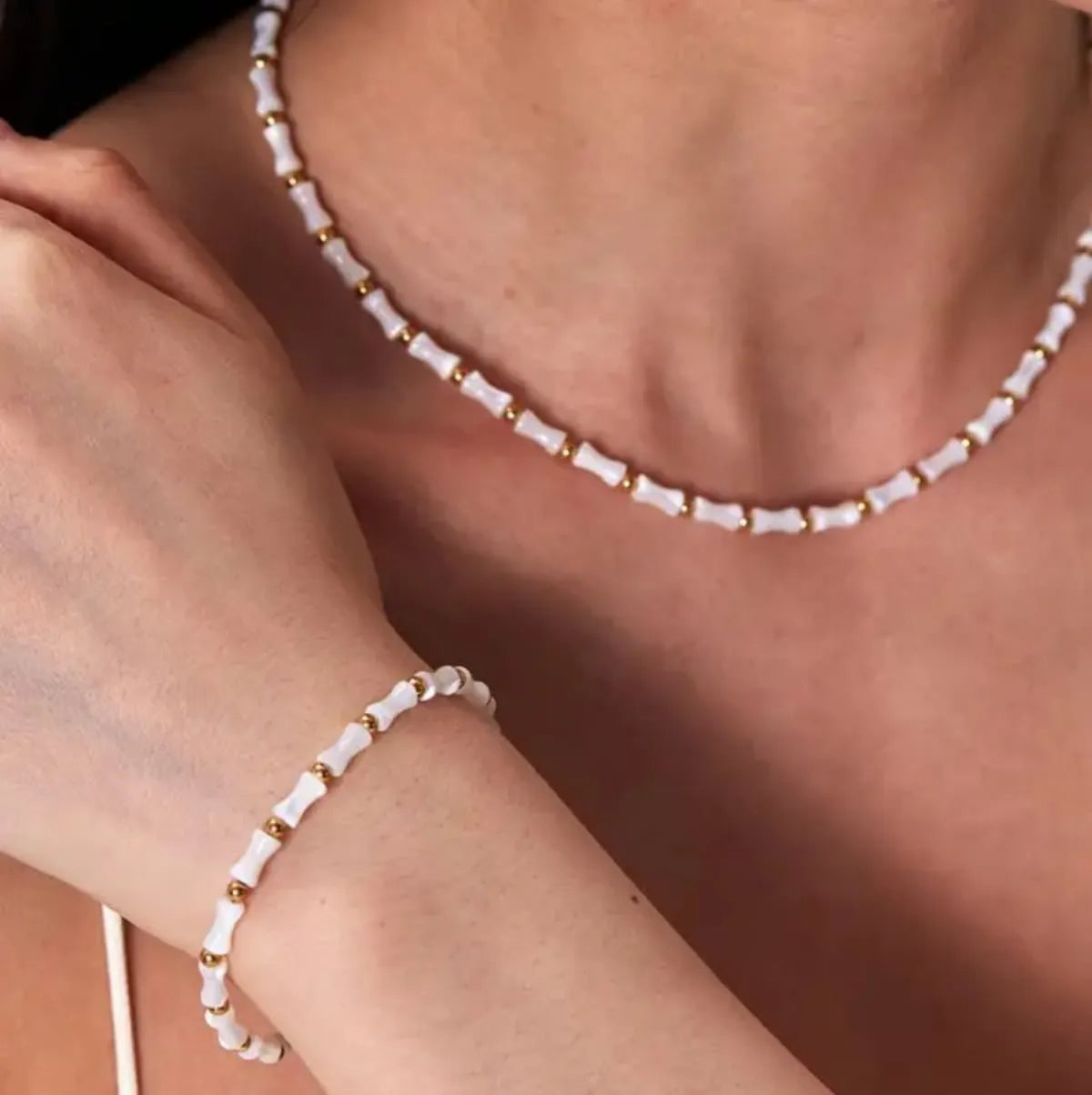 WHITE BEAD BRACELET